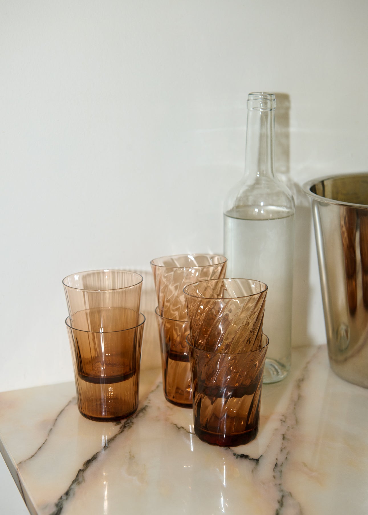 Stilleben's Concave Glassware series is a collection of drinking glasses and vases, handmade and mouth blown from crystalline glass.